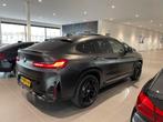BMW X4 Xdrive20i 184pk Aut 2022 Matzwart sportpakket, Auto's, BMW, 1998 cc, Zwart, 4 cilinders, 2000 kg