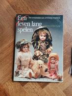 Boek over antieke poppen, Ophalen of Verzenden