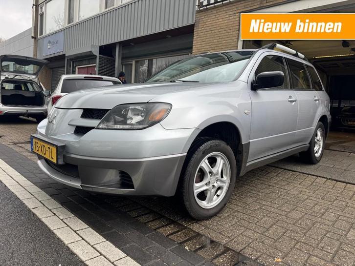 Mitsubishi OUTLANDER 2.0 Warrior 4WD AIRCO NETTE AUTO NAP AP, Auto's, Mitsubishi, Bedrijf, Outlander, 4x4, ABS, Airbags, Airconditioning
