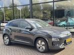 Hyundai KONA EV Fashion 64 kWh Trekhaak|Navigatie|1ste eigen, Stof, Gebruikt, Zwart, Origineel Nederlands