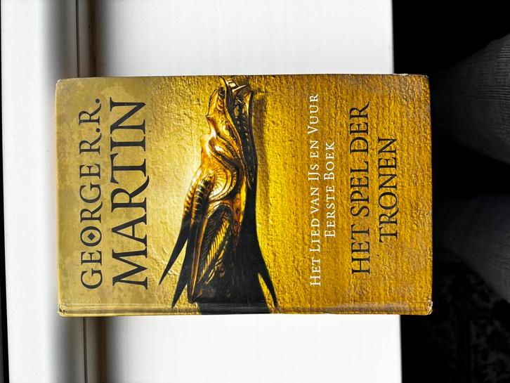 George R.R. Martin - Het spel der tronen, Boeken, Fantasy, Zo goed als nieuw, Ophalen of Verzenden