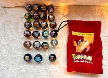 Oude pokemon knikkers in pokemon opbergzakje beschikbaar voor biedingen