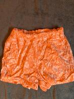 Oranje korte broek met bloemetjes - clockhouse - 34, Kort, Oranje, Ophalen of Verzenden, Zo goed als nieuw