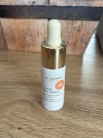 Clarins Tinted Oleo Serum 04, Ophalen of Verzenden, Zo goed als nieuw, Gehele gezicht