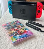 Nintendo Switch rood/blauw, Met games, Met 2 controllers, Ophalen of Verzenden, Zo goed als nieuw
