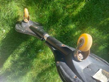 Waveboard zwart met Poema afbeelding en springstok beschikbaar voor biedingen