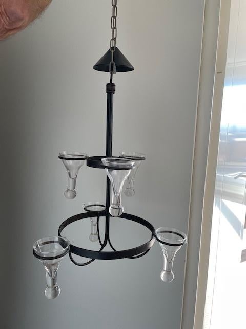 Kandelaar hangend, Ophalen