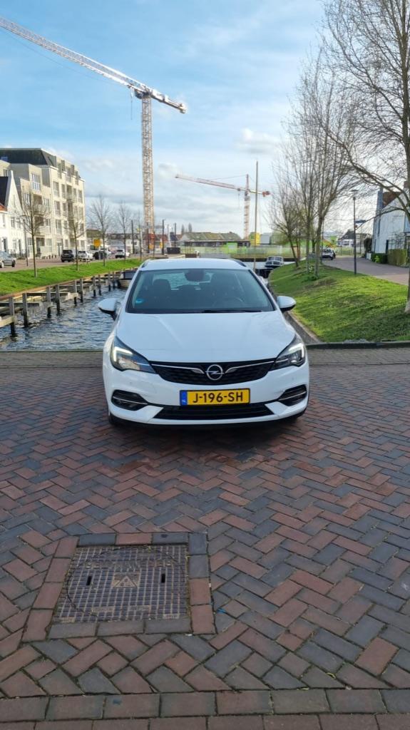 Opel Astra 1.2 Turbo 110pk Start/stop 2020 met nieuwe motor!, Auto's, Opel, Voorwielaandrijving, Stof, 1199 cc, Wit