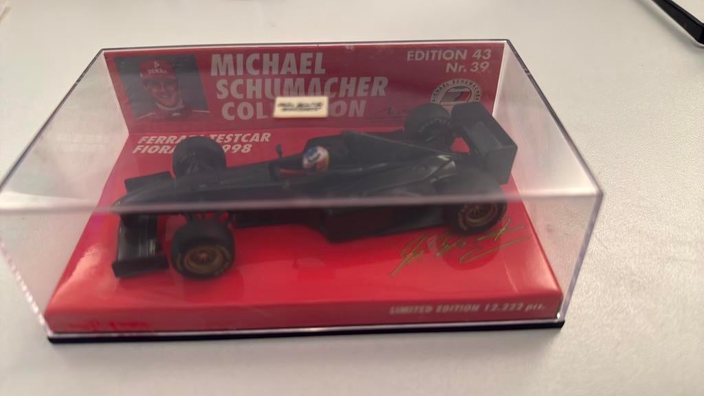 Schumacher Ferrari F300 Fiorano testcar, Ophalen of Verzenden, Zo goed als nieuw, Auto, MiniChamps