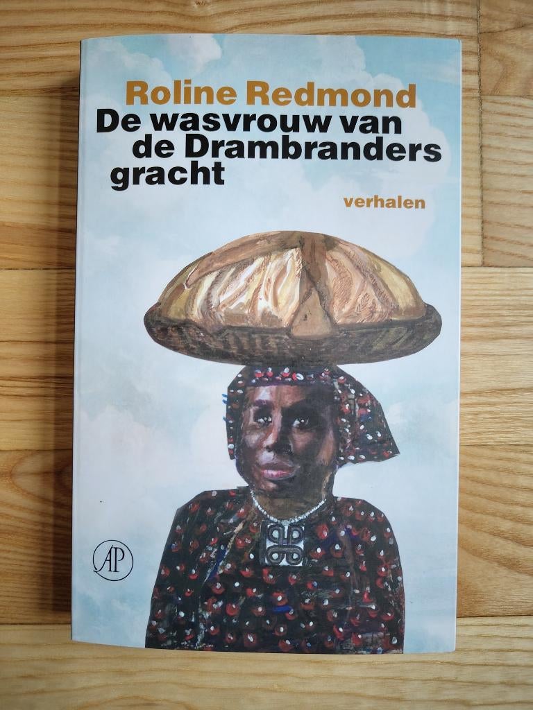 Boek De wasvrouw van de Drambrandersgracht - Roline Redmond, Ophalen of Verzenden, Zo goed als nieuw, Europa