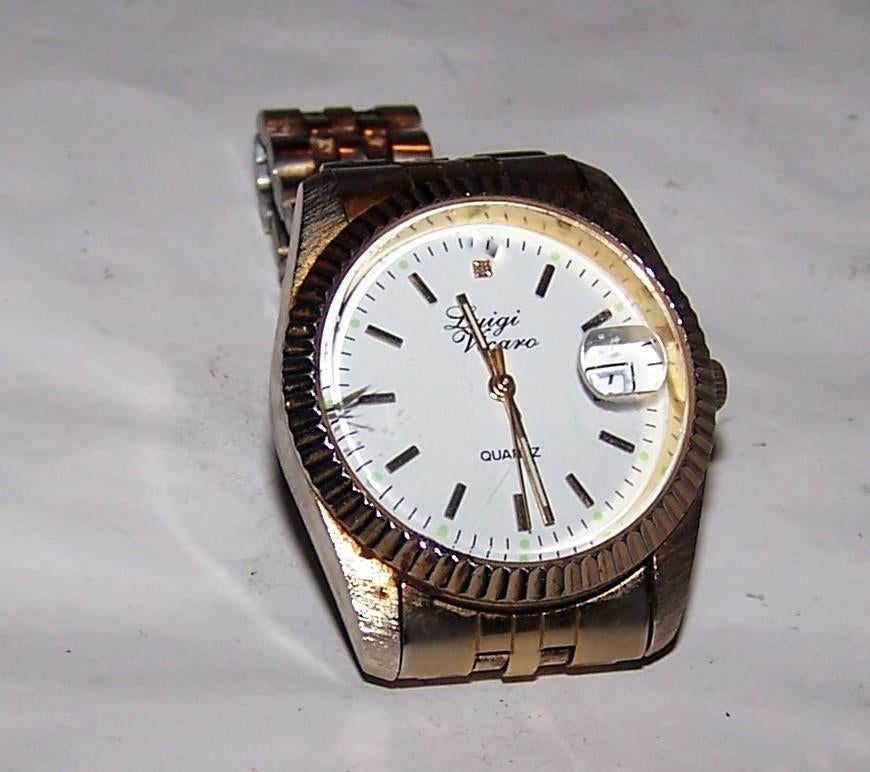 Luigi Vicaro Horloge Heren Ø 35 mm - Goudkleurig. Izgs., Sieraden, Tassen en Uiterlijk, Ophalen of Verzenden, Zo goed als nieuw