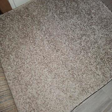 Beige vloerkleed 80x1 50  nieuw 