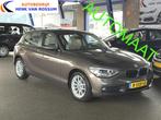 BMW 1-serie 116i High Executive Trekhaak | Leer | Navi | NAP, Auto's, BMW, Gebruikt, 4 cilinders, Bruin, 650 kg