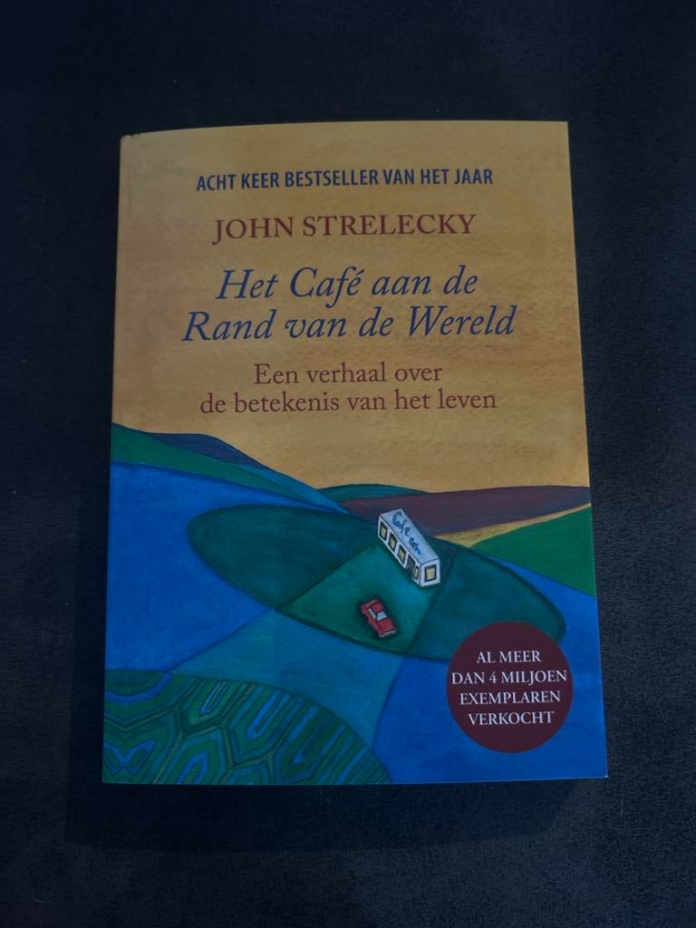 Het Café aan de Rand van de Wereld - John Strelecky, Boeken, Ophalen of Verzenden, Gelezen, Nederland