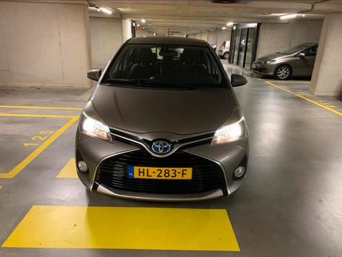 Toyota Yaris 1.5 Hybrid Dynamic 55 kW,automaat,bruin, Auto's, Toyota, Particulier, Yaris, Hybride Elektrisch/Benzine, Volledig hybride