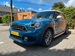 Mini Countryman Cooper SE 224pk All4 Aut. 2018 Blauw, Auto's, Mini, Blauw, Stationwagon, Vierwielaandrijving, 3 cilinders