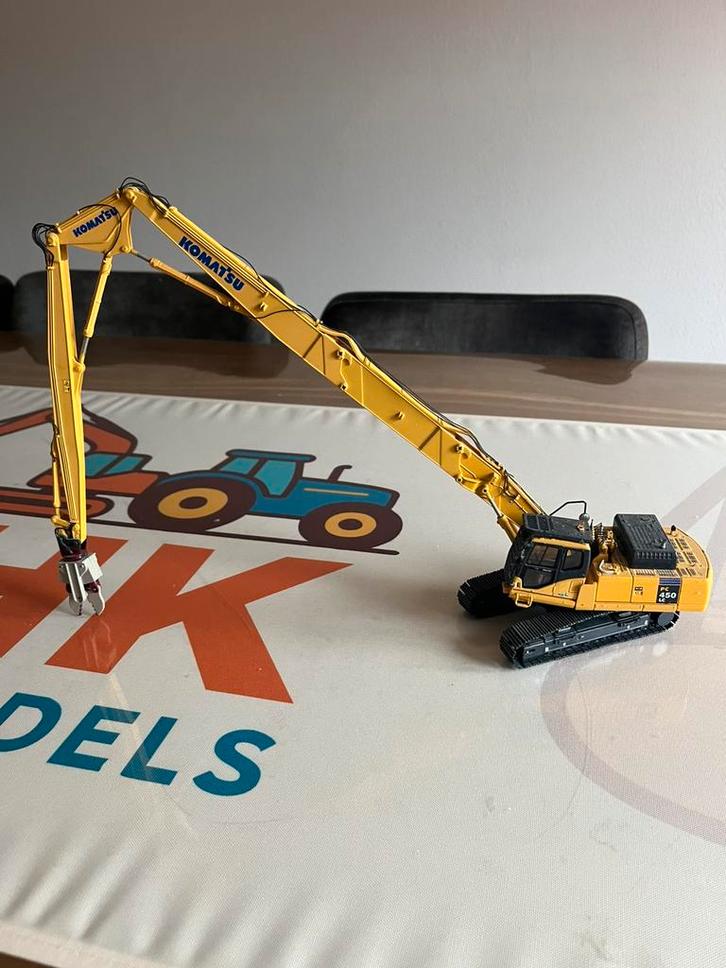 Komatsu PC 450 UHD rupskraan UH, Hobby en Vrije tijd, Modelauto's | 1:50, Zo goed als nieuw, Hijskraan, Tractor of Landbouw, Overige merken