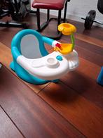 Badzitje met speelgoed, Ophalen