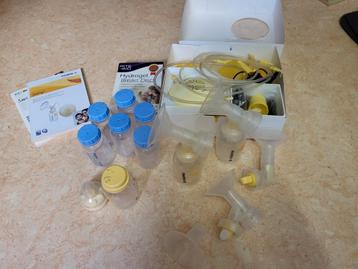 Medela Swing kolf met vele toebehoren  beschikbaar voor biedingen