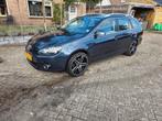 Volkswagen Golf 1.6 TDI 77KW Variant 2010 Grijs, Auto's, Voorwielaandrijving, Euro 5, Zwart, Overige bekleding