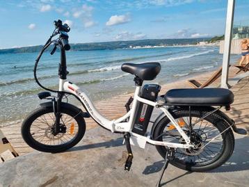 Elektrische vouwfiets met lage instap. 1jaar garantie  beschikbaar voor biedingen