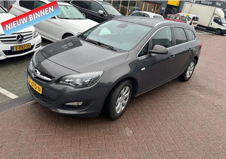 Opel Astra Sports Tourer 1.4 Turbo Blitz 88KW ST 2015 Grijs, Auto's, Opel, Bedrijf, Te koop, Astra, ABS, Airbags, Bluetooth, Boordcomputer