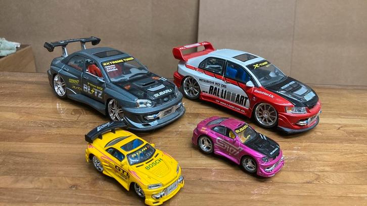 Kentoys subaru sti en Mitsubishi evo lX. 1/24, Hobby en Vrije tijd, Modelauto's | 1:24, Gebruikt, Auto, Overige merken, Ophalen of Verzenden