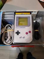 Nintendo gameboy in reiskoffer boekjes en etc., Ophalen of Verzenden