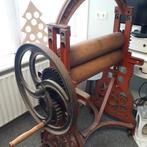 Ouderwetse papier press, Ophalen