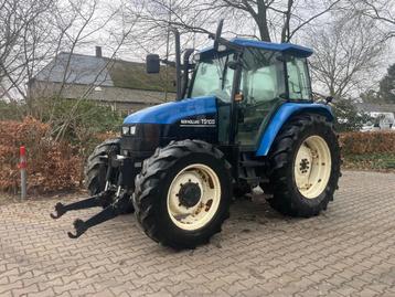 New Holland TS 100 tractor met Fronthef fendt case john Deer beschikbaar voor biedingen