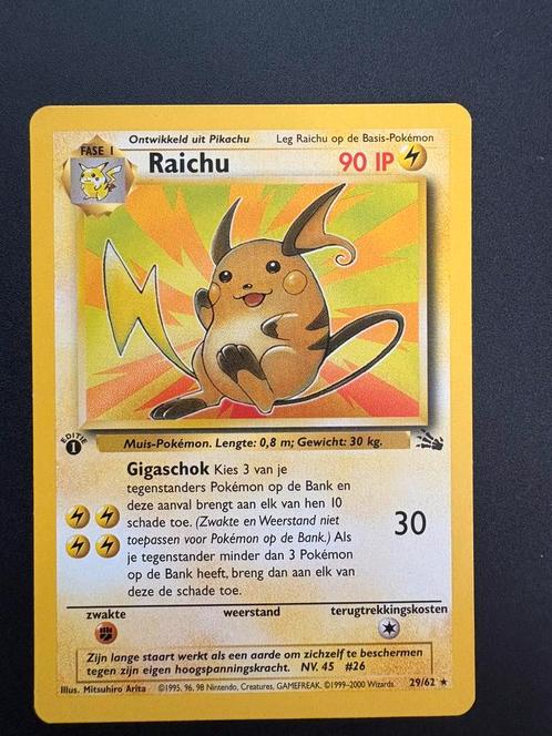 Raichu (First edition) 29/62 Fossil NL NM, Hobby en Vrije tijd, Verzamelkaartspellen | Pokémon, Zo goed als nieuw, Losse kaart