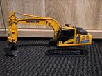 Komatsu 215, Verzenden, Zo goed als nieuw, Bus of Vrachtwagen