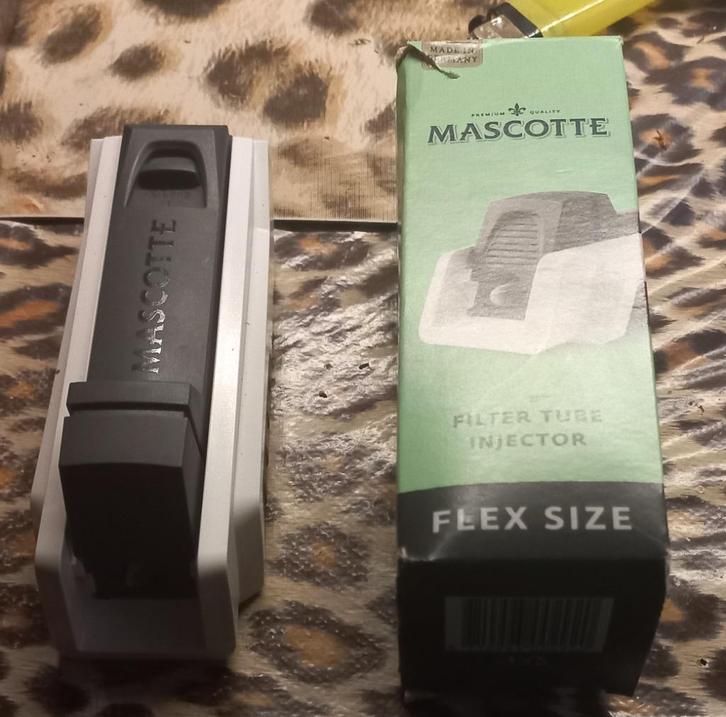 Mascotte Flex hulzenstopper, Verzamelen, Rookartikelen, Aanstekers en Luciferdoosjes, Zo goed als nieuw, Ophalen of Verzenden