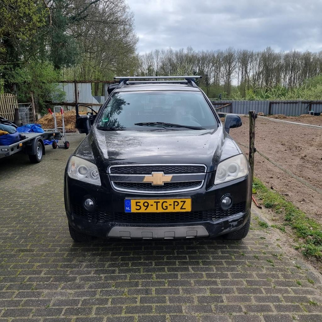 Chevrolet Captiva 2.4 2WD 2006 Zwart, Auto's, Voorwielaandrijving, 136 pk, Zwart, 4 cilinders