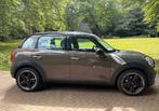 Mini Countryman 1.6 Cooper 2011 Bruin, Voorwielaandrijving, Bruin, 4 stoelen, 122 pk