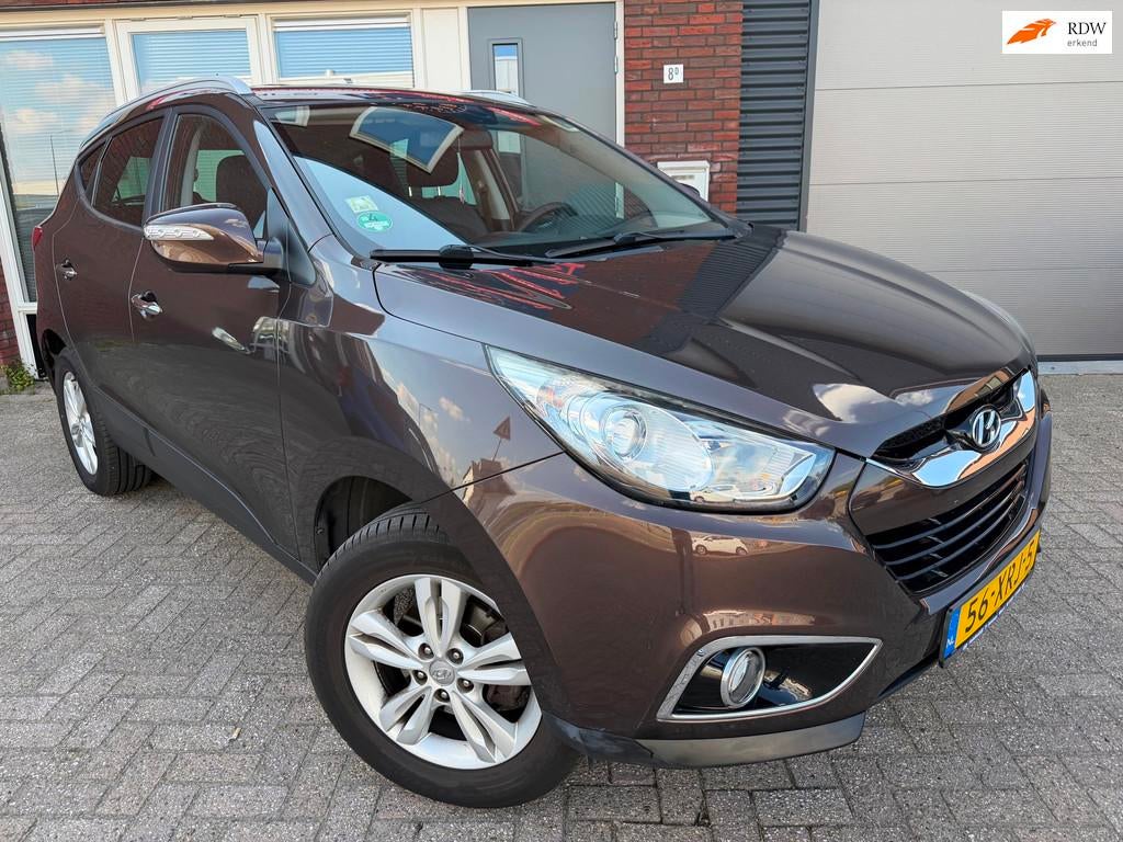 Hyundai Ix35 2.0i Style / Navi / Leder / Camera / Clima / NA, Gebruikt, 4 cilinders, Leder en Stof, 163 pk