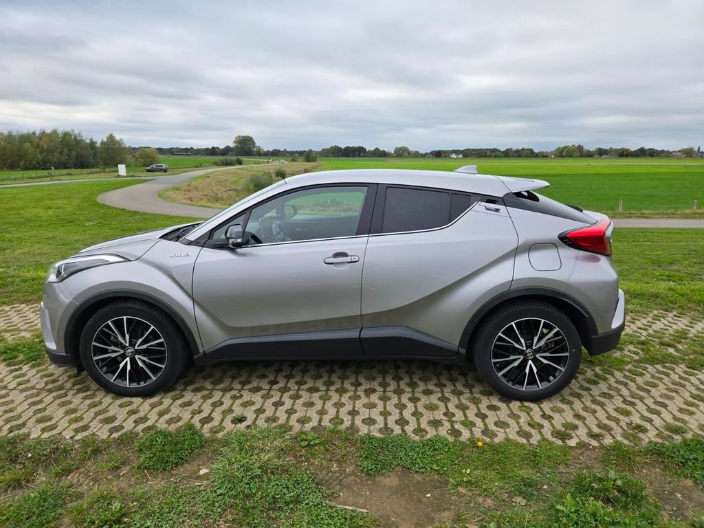 Toyota C-HR 1.8 Hybrid 122pk CVT 2017 Grijs, Auto's, Toyota, 725 kg, 4 cilinders, 75 €/maand, 26 km/l