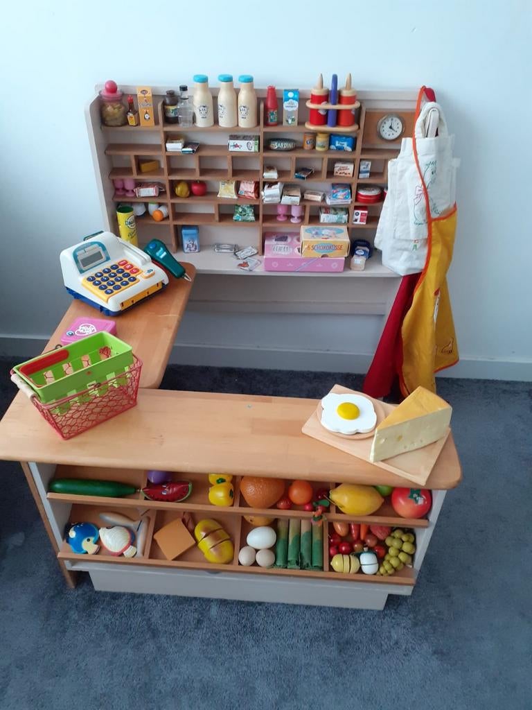 Houten speelgoedwinkel, Ophalen