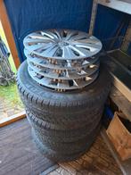 Winterbanden 5x100 met vw wieldoppen, Ophalen, Gebruikt