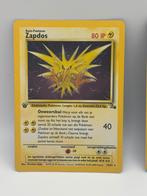 Pokemon kaart Zapdos 1st edition Fossil vintage, Ophalen of Verzenden, Zo goed als nieuw, Losse kaart, Foil