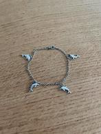 Zilveren kinder bedel armband met 4 dolfijnen, Ophalen of Verzenden, Zo goed als nieuw, Zilver, Met bedels of kralen