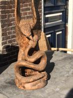 Uniek houten snijwerk van een adelaar met slang, Ophalen