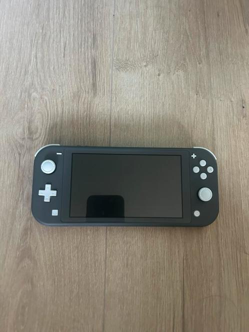Nintendo Switch Lite + Hoes, Spelcomputers en Games, Spelcomputers | Nintendo Switch Lite, Zo goed als nieuw, Grijs, Met beschermhoes of tas