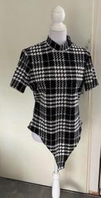 Zwart-wit geblokte body, maat 1XL (qwe), Ophalen of Verzenden, Zo goed als nieuw, Zwart, Broek of Spijkerbroek