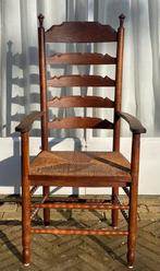 Houten leunstoel met rieten zitting, Ophalen