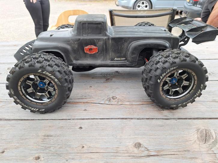 Super dikke traxxas E-Revo, Hobby en Vrije tijd, Modelbouw | Radiografisch | Auto's, Gebruikt, Auto offroad, Elektro, Ophalen of Verzenden