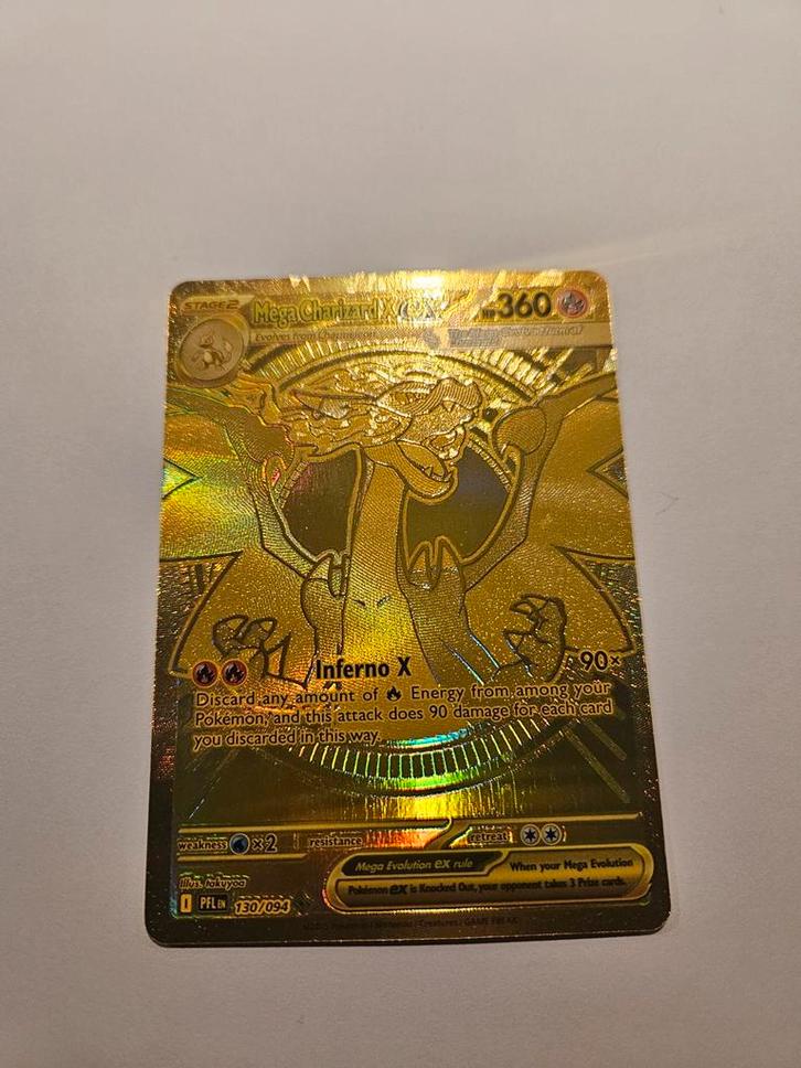 Mega Charizard X Gouden Pokémon Kaart, Hobby en Vrije tijd, Spaarzegeltjes, Voorwerp of Figuurtje, Overige soorten, Ophalen of Verzenden