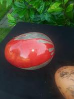 Eieren rood en bruin raku, Ophalen
