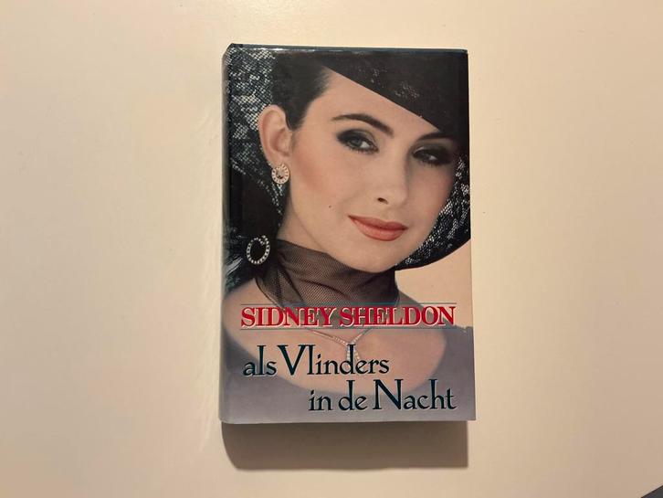Als Vlinders in de Nacht, Sidney Sheldon, Boeken, Thrillers, Zo goed als nieuw, Ophalen of Verzenden