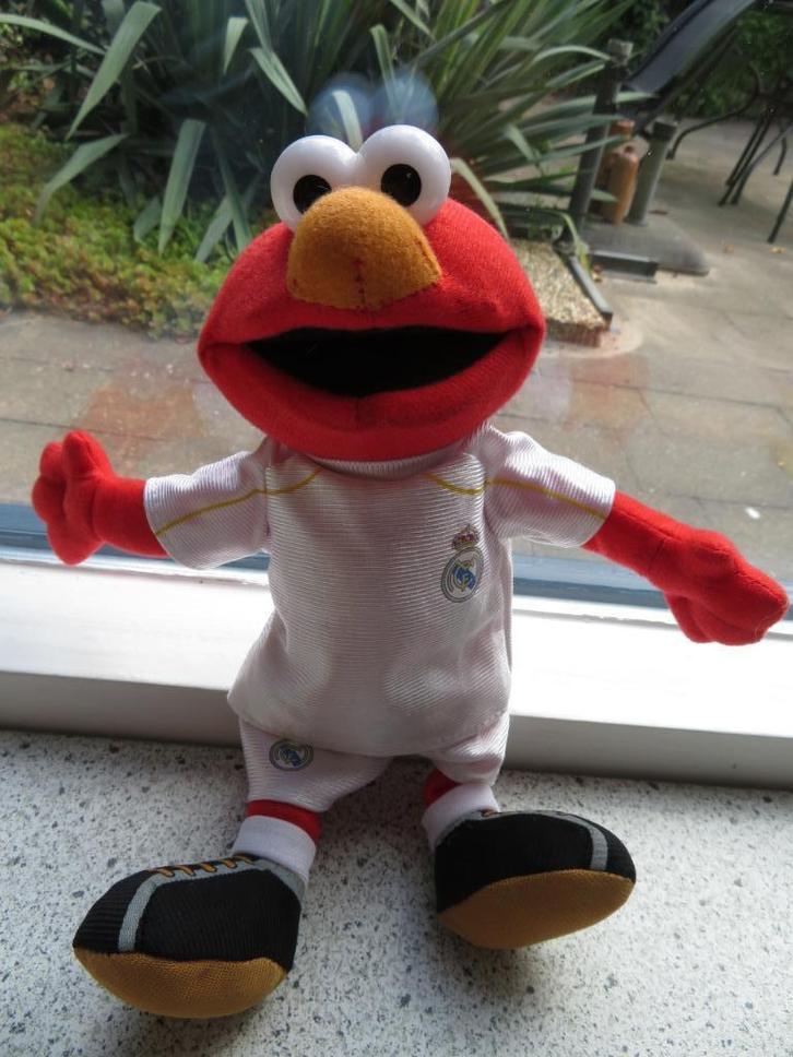 Elmo met sportkleding voetbal REAL MADRID meet ca 25 cm, Kinderen en Baby's, Speelgoed | Knuffels en Pluche, Gebruikt, Overige typen
